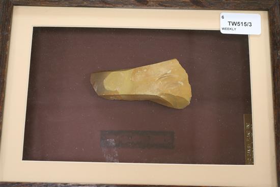 A collection of framed Neolithic and other tools and flint arrow heads,